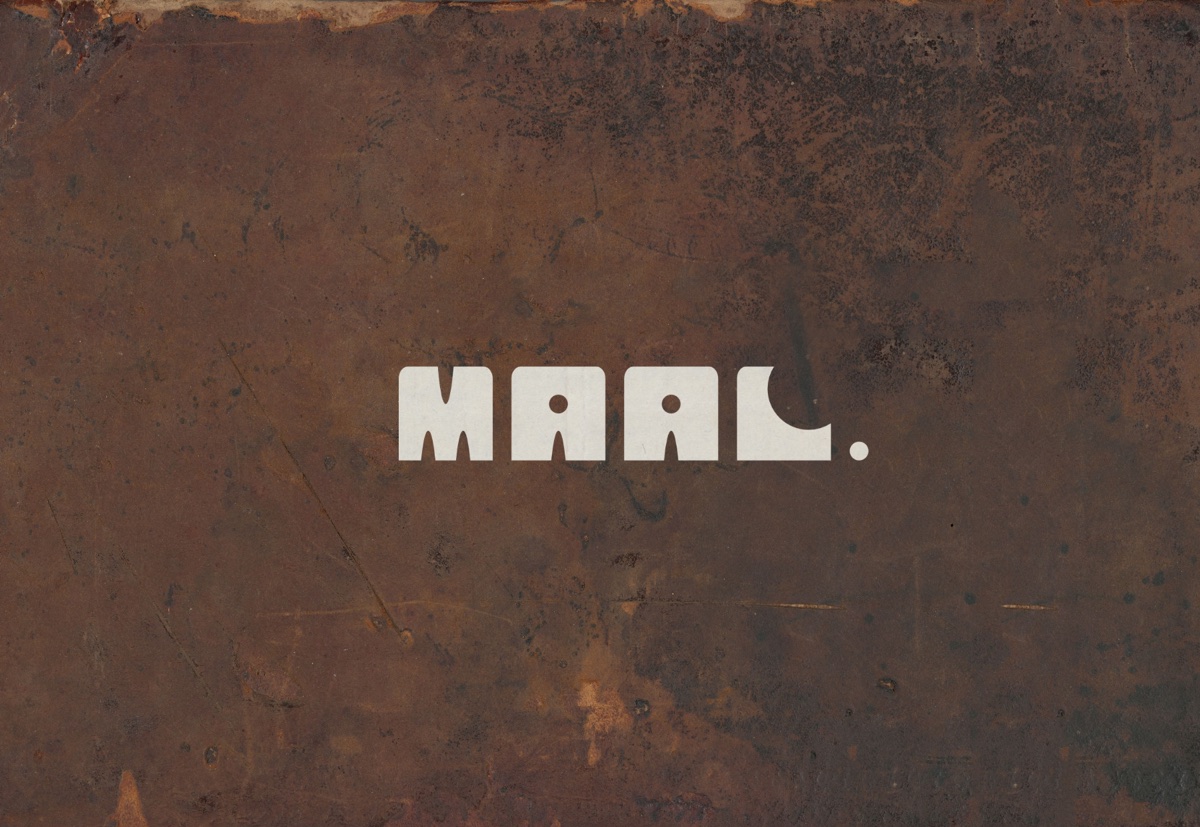 Maal logo set into a leather folder.