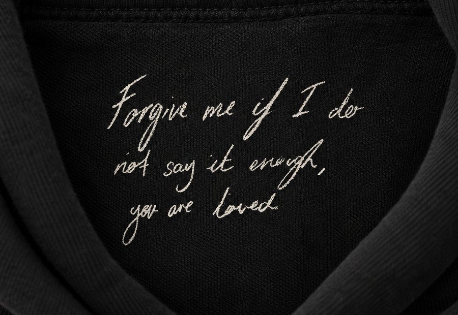 Mahal: the line embroidered inside the hood — forgive me if I do not say it enough, you are loved.